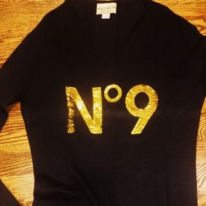 Black wild fox sweater with gold sequin detail